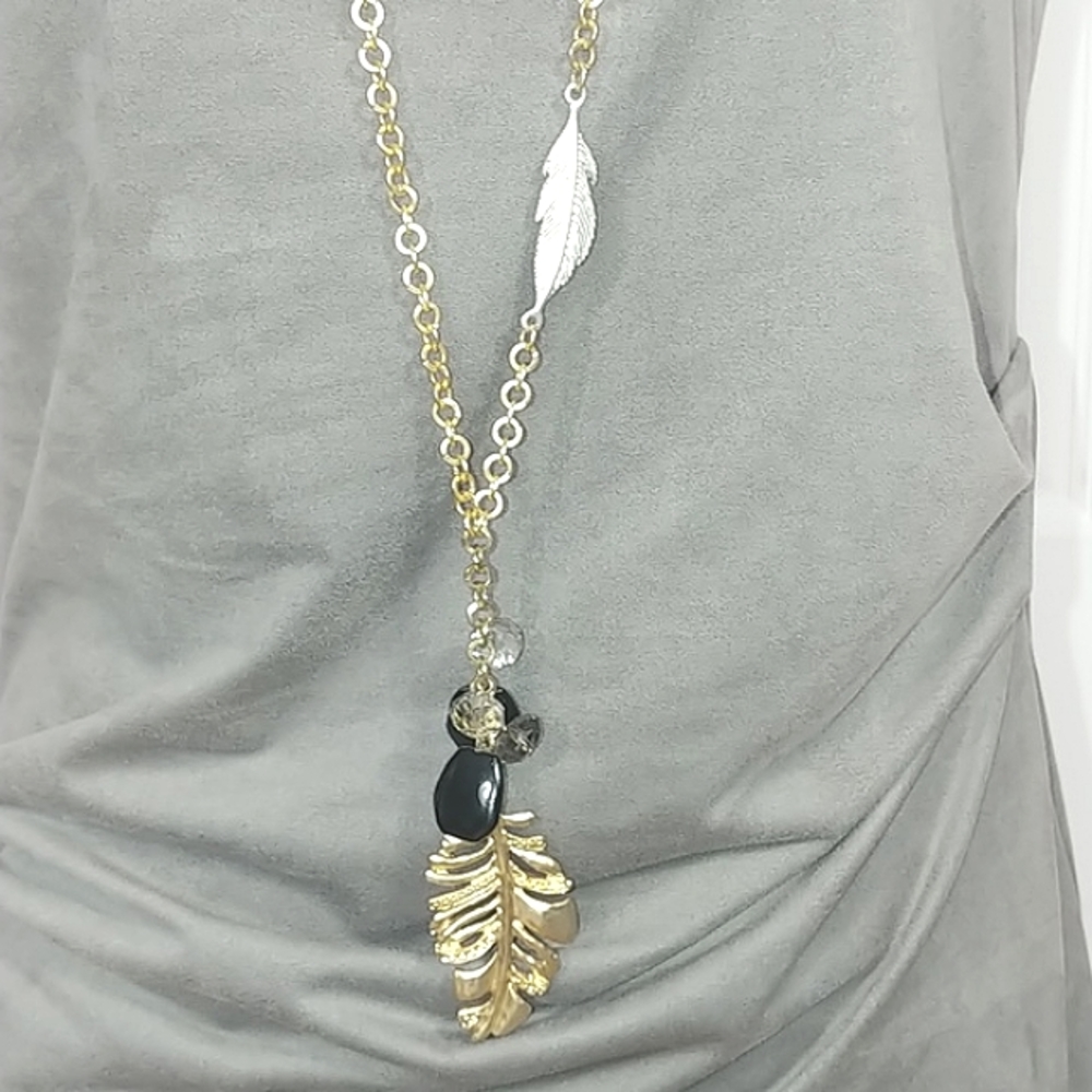 Metal feathers long gold necklace NWT
